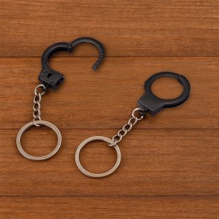 CHAVEIRO EM METAL COM FORMATO DE ALGEMA